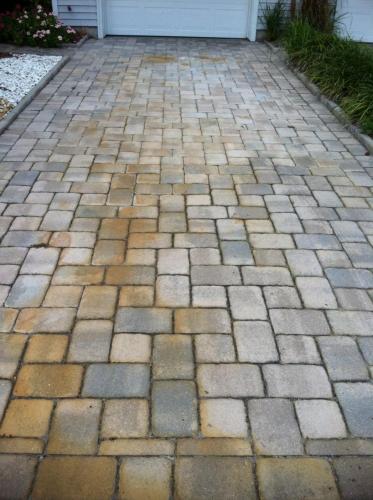 Battery Acid Stains on Pavers Before